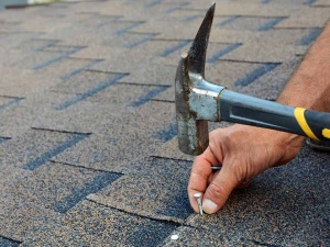 The Many Risks of Repairing Your Own Roof